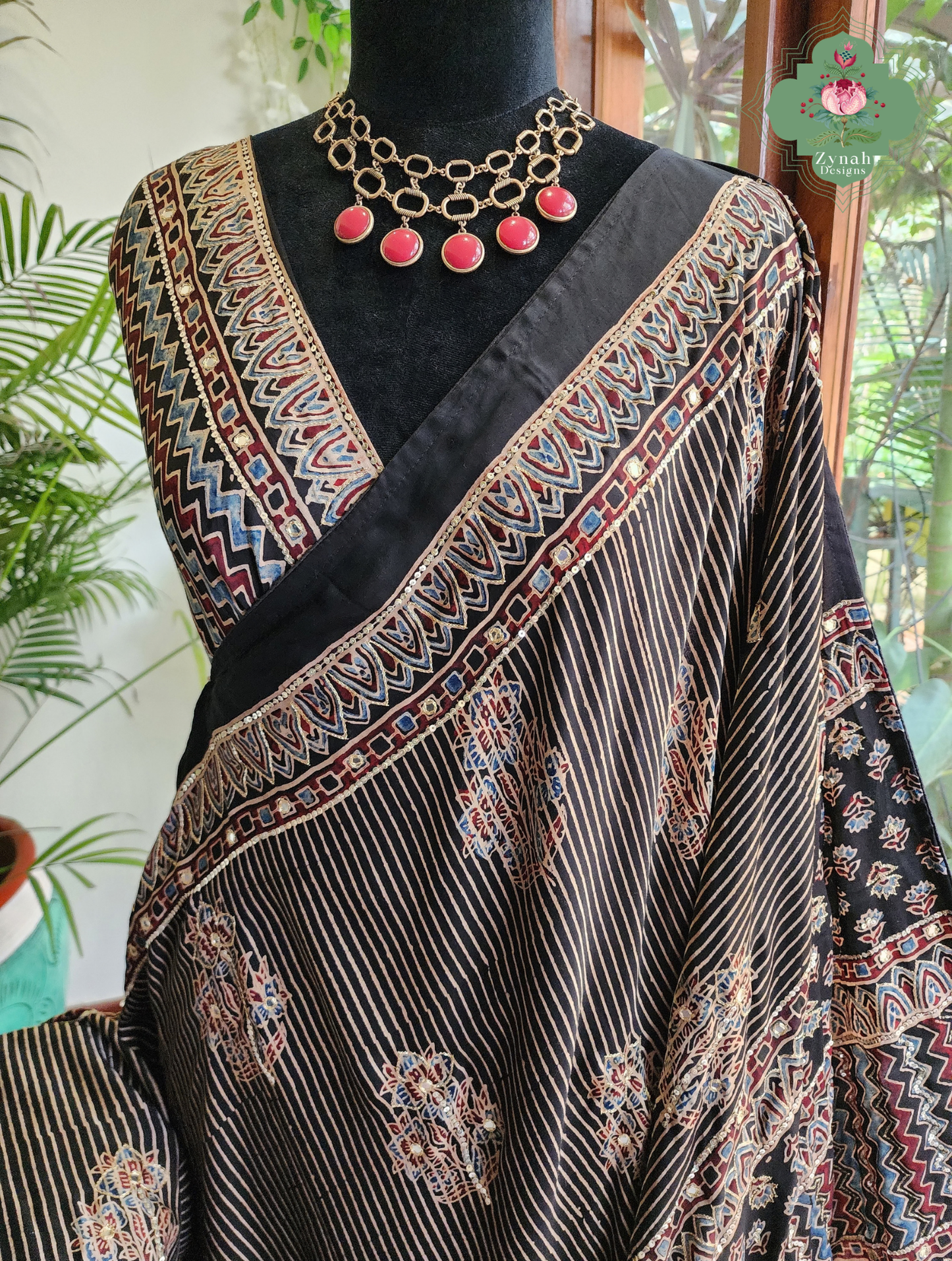 Zynah Sunehri Viraasat – Beige & Black Ajrakh Modal Silk Saree with Hand Embellishments