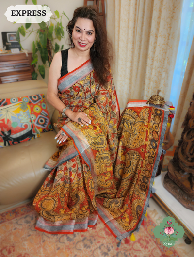 Beige & Red Linen Saree with Kalamkari Print, timeless elegance and artistry for any occasion.