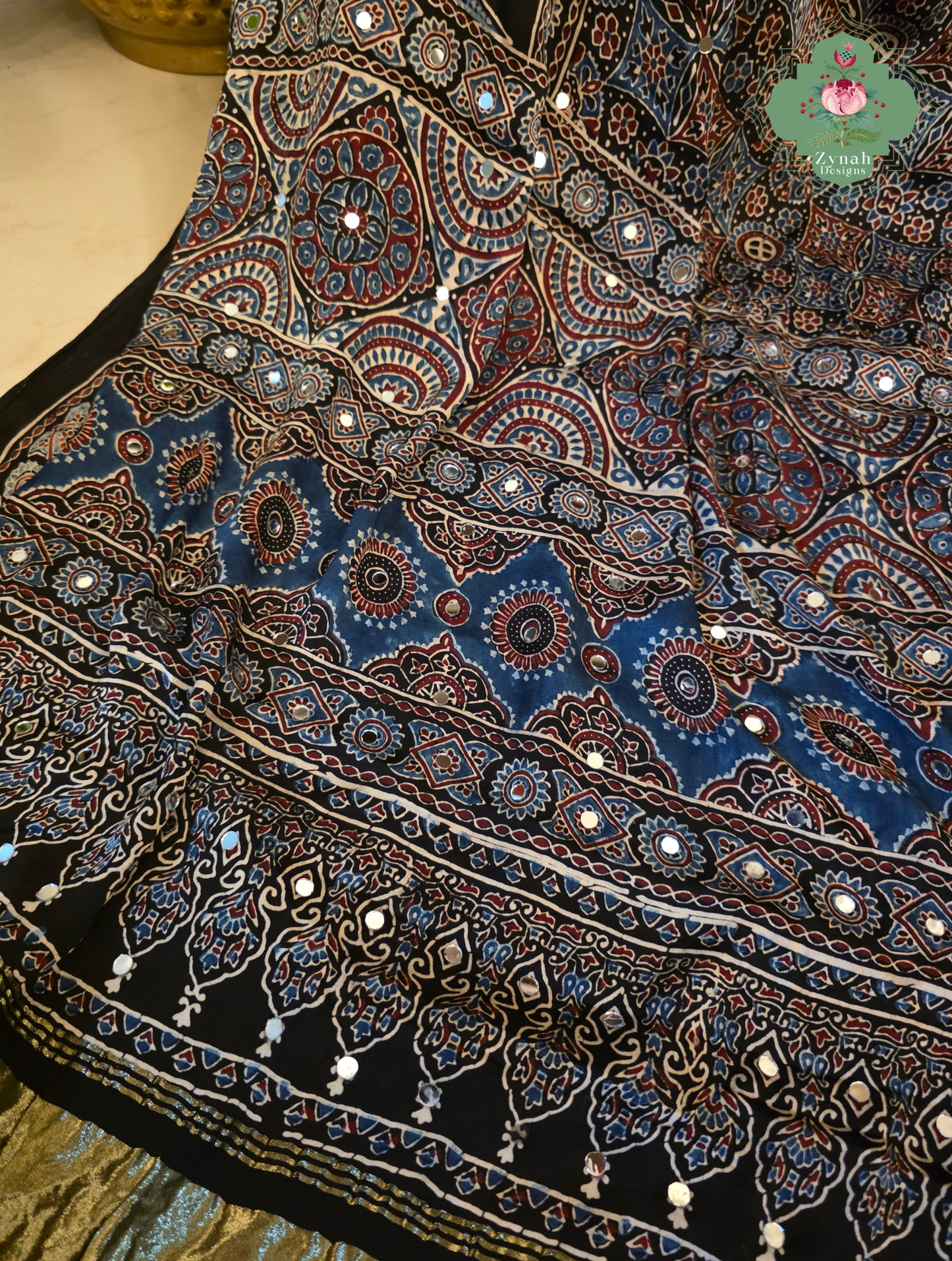 Dilruba Black Modal Silk Ajrakh Saree With Mirror Work And Lagdi Patta Pallu