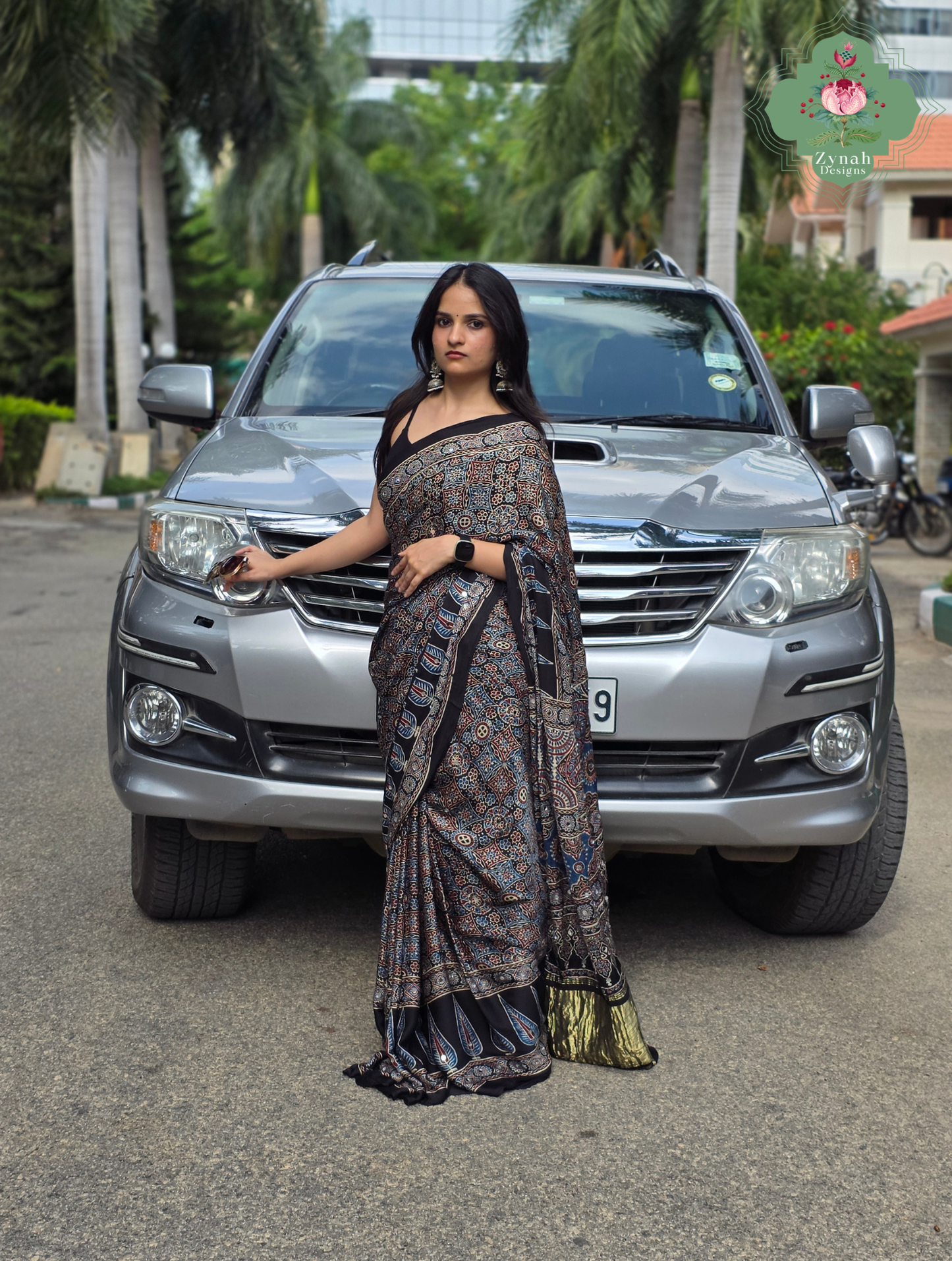 Dilruba Black Modal Silk Ajrakh Saree With Mirror Work And Lagdi Patta Pallu