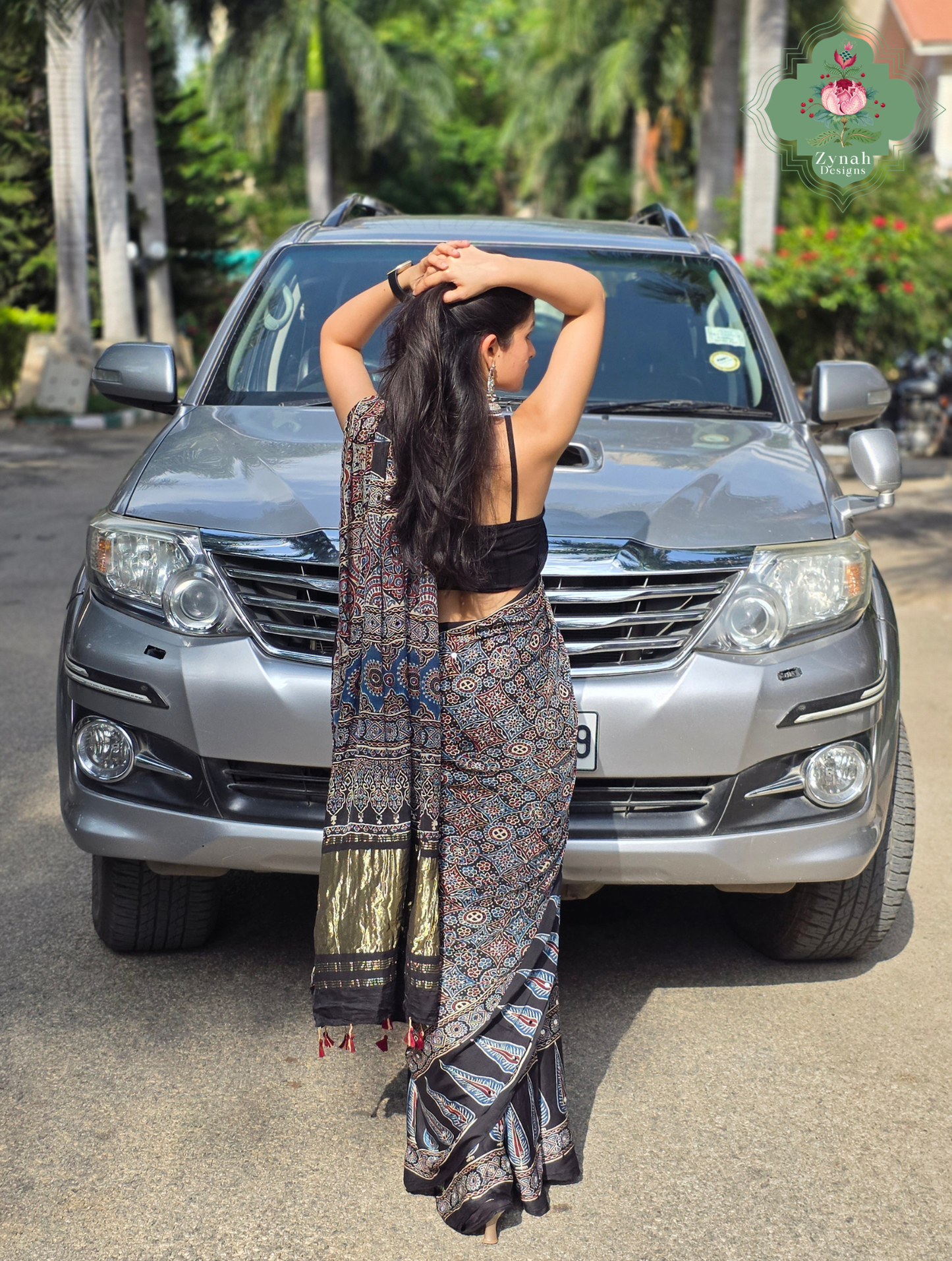 Dilruba Black Modal Silk Ajrakh Saree With Mirror Work And Lagdi Patta Pallu