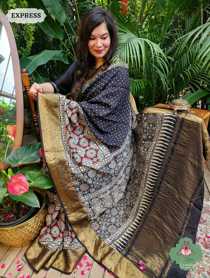 Zynah Black & Maroon Dola Silk Ajrakh Block Printed Saree With Zari Border; Custom Stitched/Ready-made Blouse, Fall, Petticoat; SKU: 1110202402