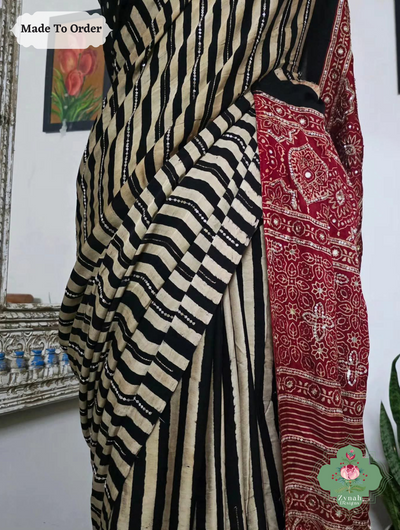 Zynah Made To Order Black & Madder Red Ajrakh Modal Silk Saree With Lagdi Patta Pallu & Hand Embellishments; Custom Stitched/Ready-made Blouse, Fall, Petticoat; SKU:1909202505