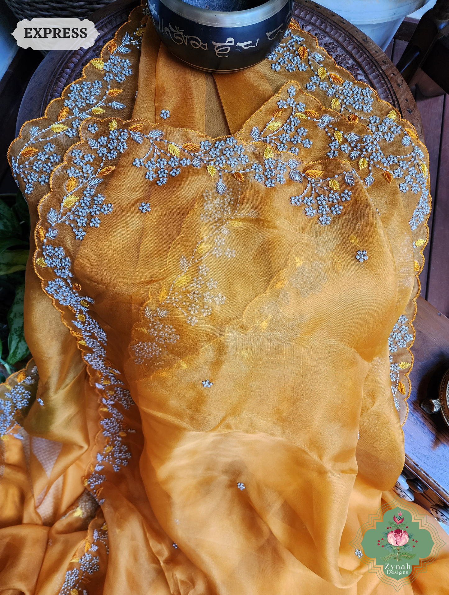 Zynah Burnt Yellow Organza Silk Saree With Pearls & Sequins Hand Embellishments; Custom Stitched/Ready-made Blouse, Fall, Petticoat; SKU: 2711202401