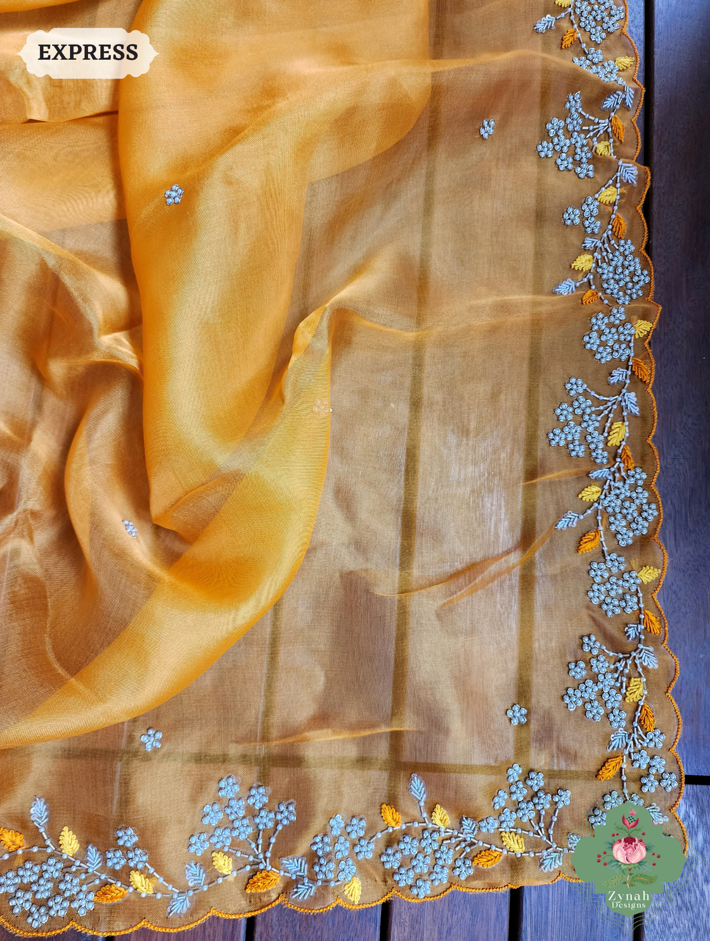 Zynah Burnt Yellow Organza Silk Saree With Pearls & Sequins Hand Embellishments; Custom Stitched/Ready-made Blouse, Fall, Petticoat; SKU: 2711202401