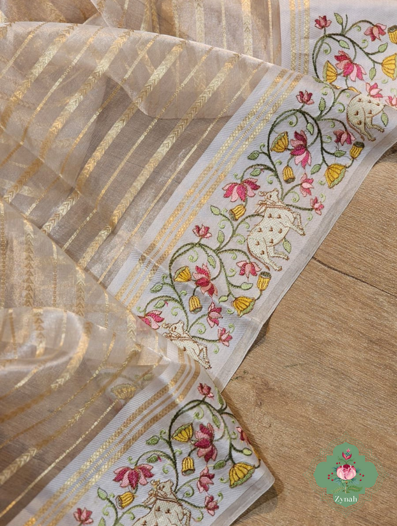 Cream Pure Silver Tissue Silk Saree With Banarasi Stripes, Katan Pallu & Pichwai Embroidery 7Cream Pure Silver Tissue Silk Saree With Banarasi Stripes, Katan Pallu & Pichwai Embroidery 8