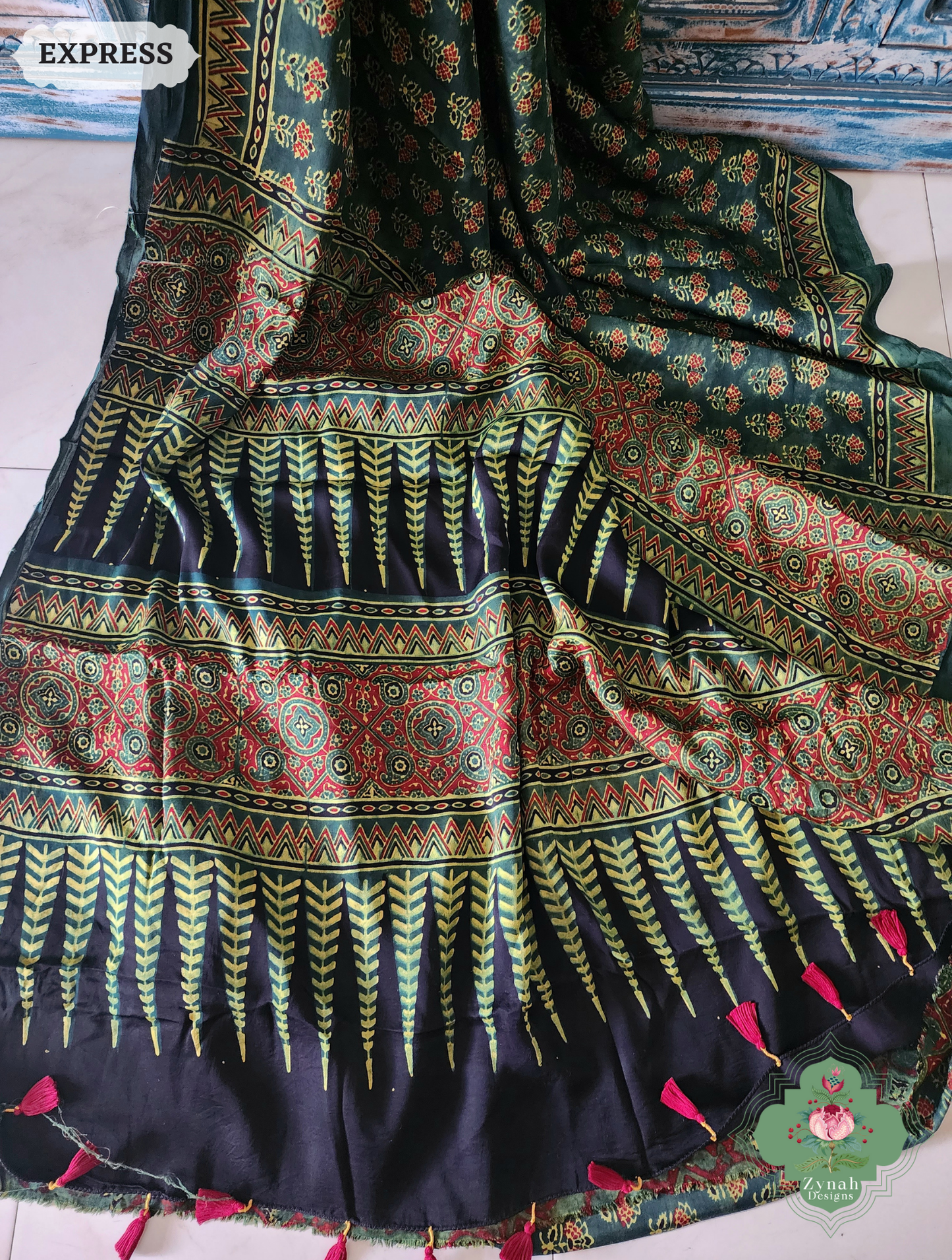 Zynah Green & Red Ajrakh Modal Silk Saree Crafted Using The Traditional Method Of Hand Block Printing Using 100% Natural Dyes; Custom Stitched/Ready-made Blouse, Fall, Petticoat; SKU: 1402202504