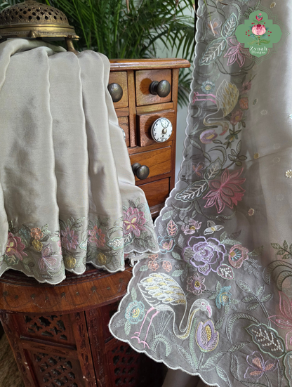 Shaam-E-Gul Grey Organza Silk Saree With Designer Crane & Floral Embroidery