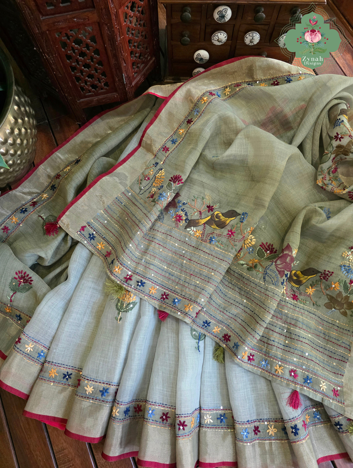 Gunjan | Hand Painted Earthy Green Linen Tissue Saree With Hand Embroidery