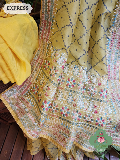 Zynah Lemon Yellow Organza Silk Saree With Bandhani Prints & Multi-coloured Embroidery On Pallu And Border; Custom Stitched/Ready-made Blouse, Fall, Petticoat; SKU: 1905202303