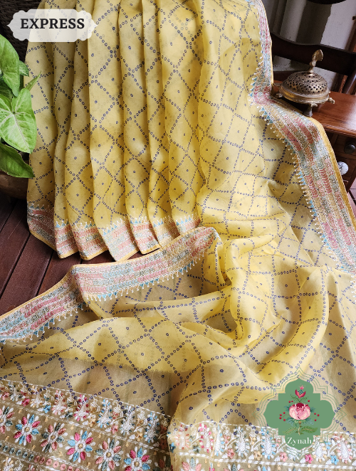 Zynah Lemon Yellow Organza Silk Saree With Bandhani Prints & Multi-coloured Embroidery On Pallu And Border; Custom Stitched/Ready-made Blouse, Fall, Petticoat; SKU: 1905202303