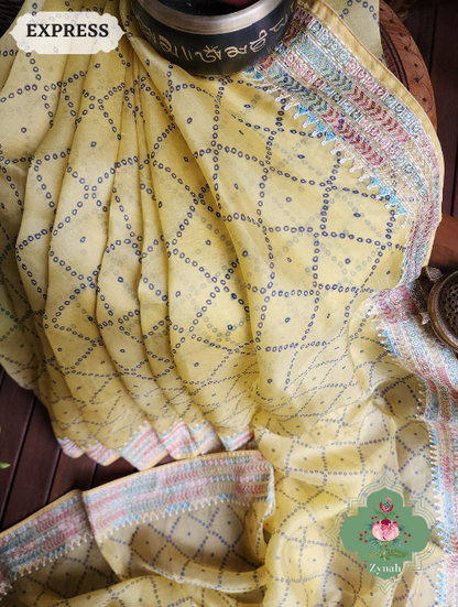 Zynah Lemon Yellow Organza Silk Saree With Bandhani Prints & Multi-coloured Embroidery On Pallu And Border; Custom Stitched/Ready-made Blouse, Fall, Petticoat; SKU: 1905202303