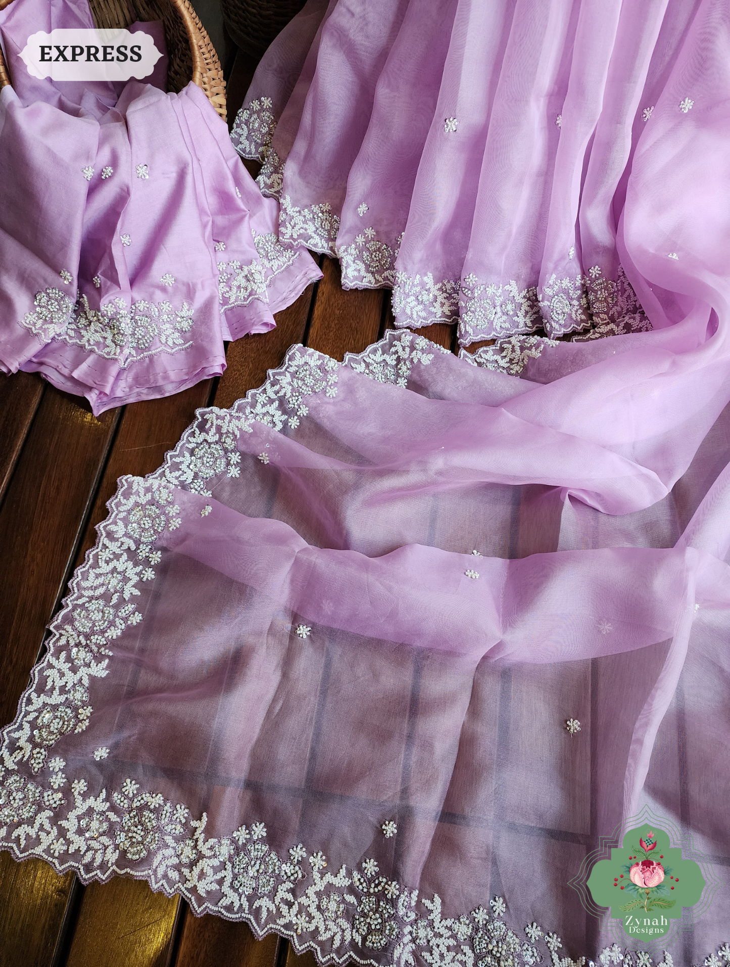 Zynah Lilac Organza Silk Saree With Pearls, Cutdana & Sequins Hand Embellishments; Custom Stitched/Ready-made Blouse, Fall, Petticoat; SKU: 2711202404