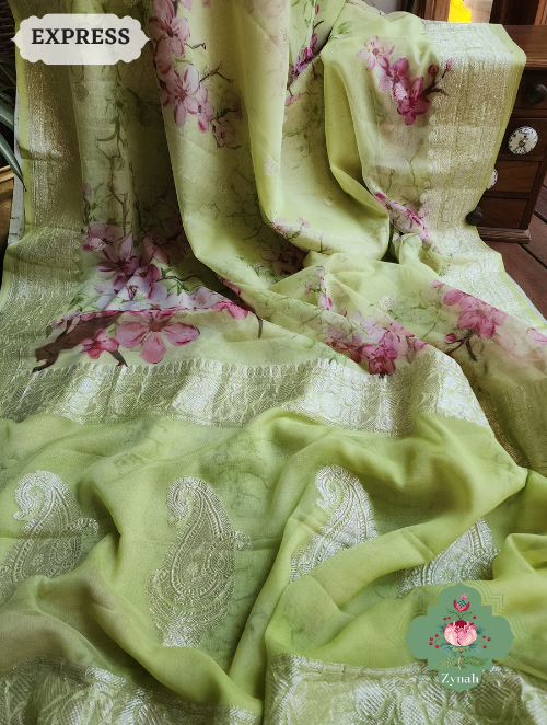Lime Khaddi Georgette Floral Banarasi Saree w/ Silver Zari. Radiates elegance & grace. Perfect for any occasion.