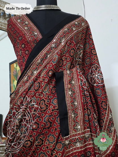 Zynah Made To Order Madder Red Ajrakh Modal Silk Saree With Lagdi Patta Pallu & Hand Embellishments; Custom Stitched/Ready-made Blouse, Fall, Petticoat; SKU:1909202510