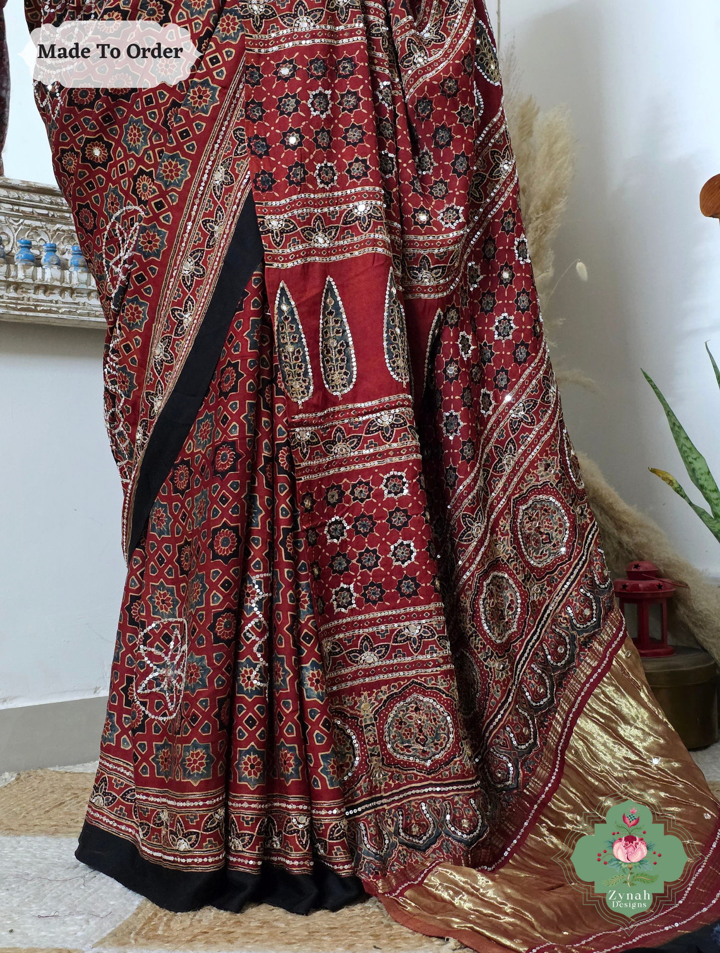 Zynah Made To Order Madder Red Ajrakh Modal Silk Saree With Lagdi Patta Pallu & Hand Embellishments; Custom Stitched/Ready-made Blouse, Fall, Petticoat; SKU:1909202510