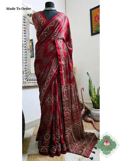 Zynah Made To Order Madder Red Ajrakh Modal Silk Saree With Hand Embellishments; Custom Stitched/Ready-made Blouse, Fall, Petticoat; SKU:1909202511