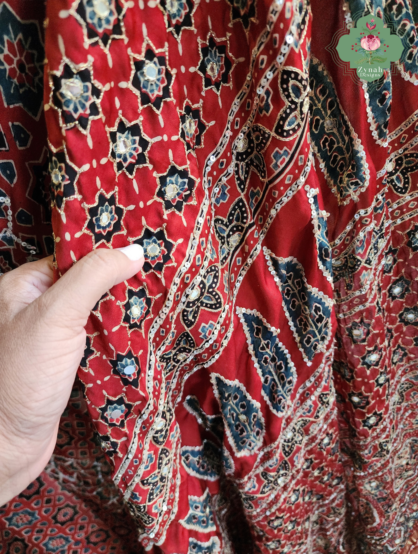 Zynah Kirmizi – Madder Red Pure Modal Silk Ajrakh Saree with Ajrakh Hand Block Printing & Artisan Adornments