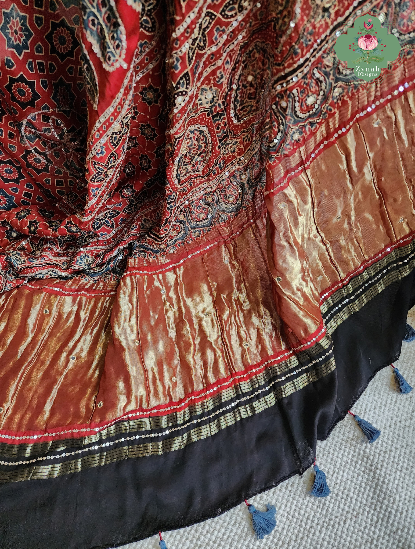 Zynah Kirmizi – Madder Red Pure Modal Silk Ajrakh Saree with Ajrakh Hand Block Printing & Artisan Adornments