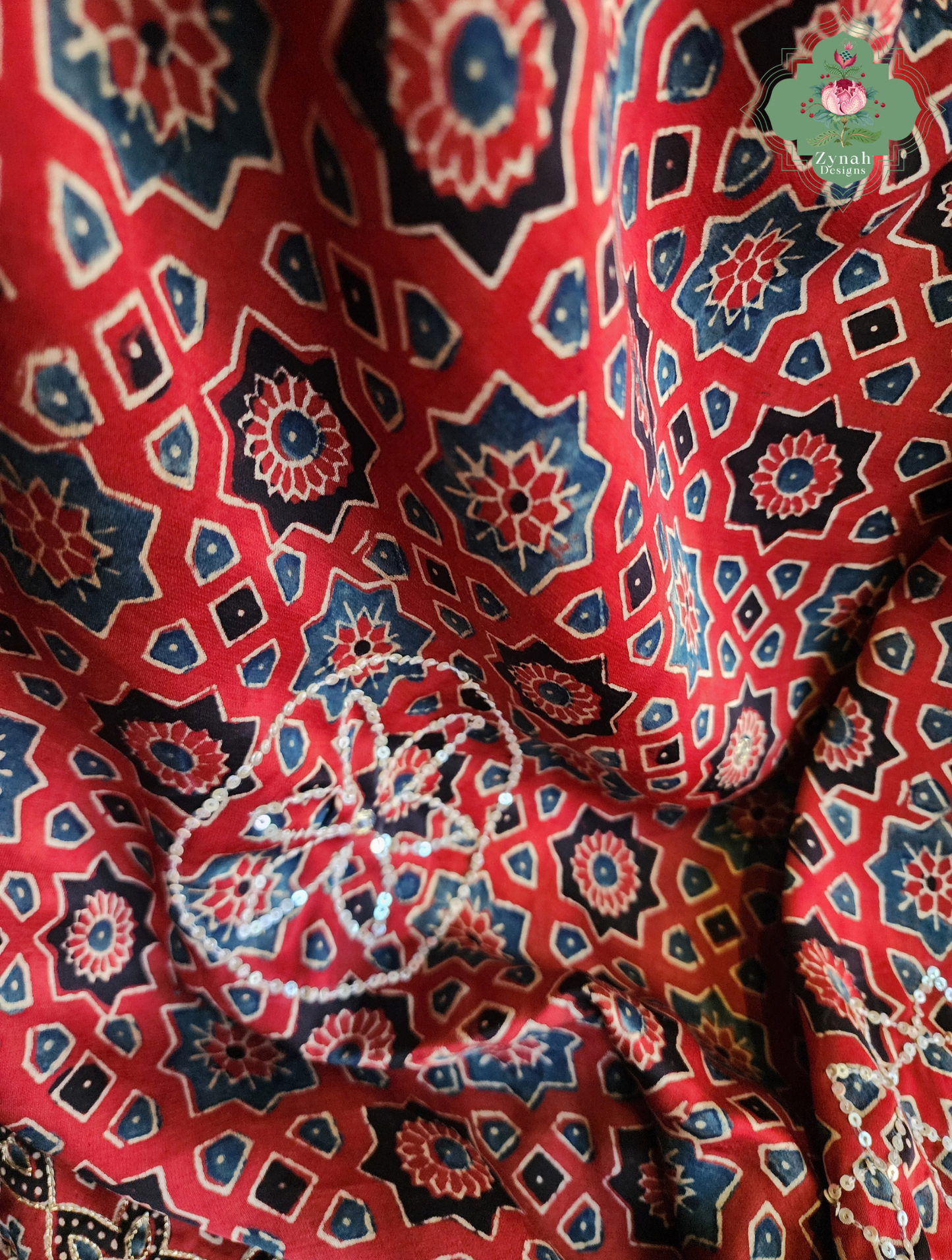 Zynah Kirmizi – Madder Red Pure Modal Silk Ajrakh Saree with Ajrakh Hand Block Printing & Artisan Adornments