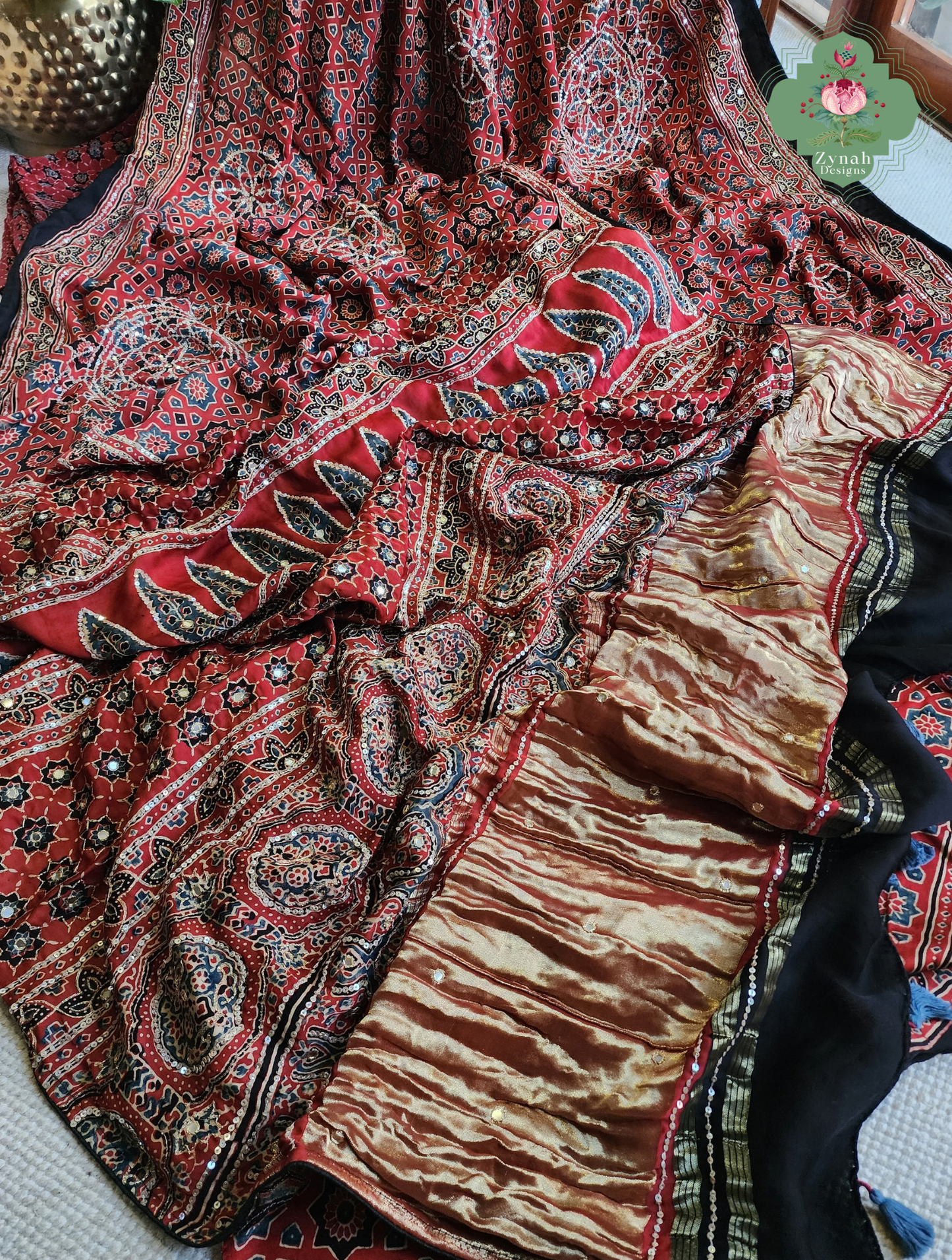 Zynah Kirmizi – Madder Red Pure Modal Silk Ajrakh Saree with Ajrakh Hand Block Printing & Artisan Adornments