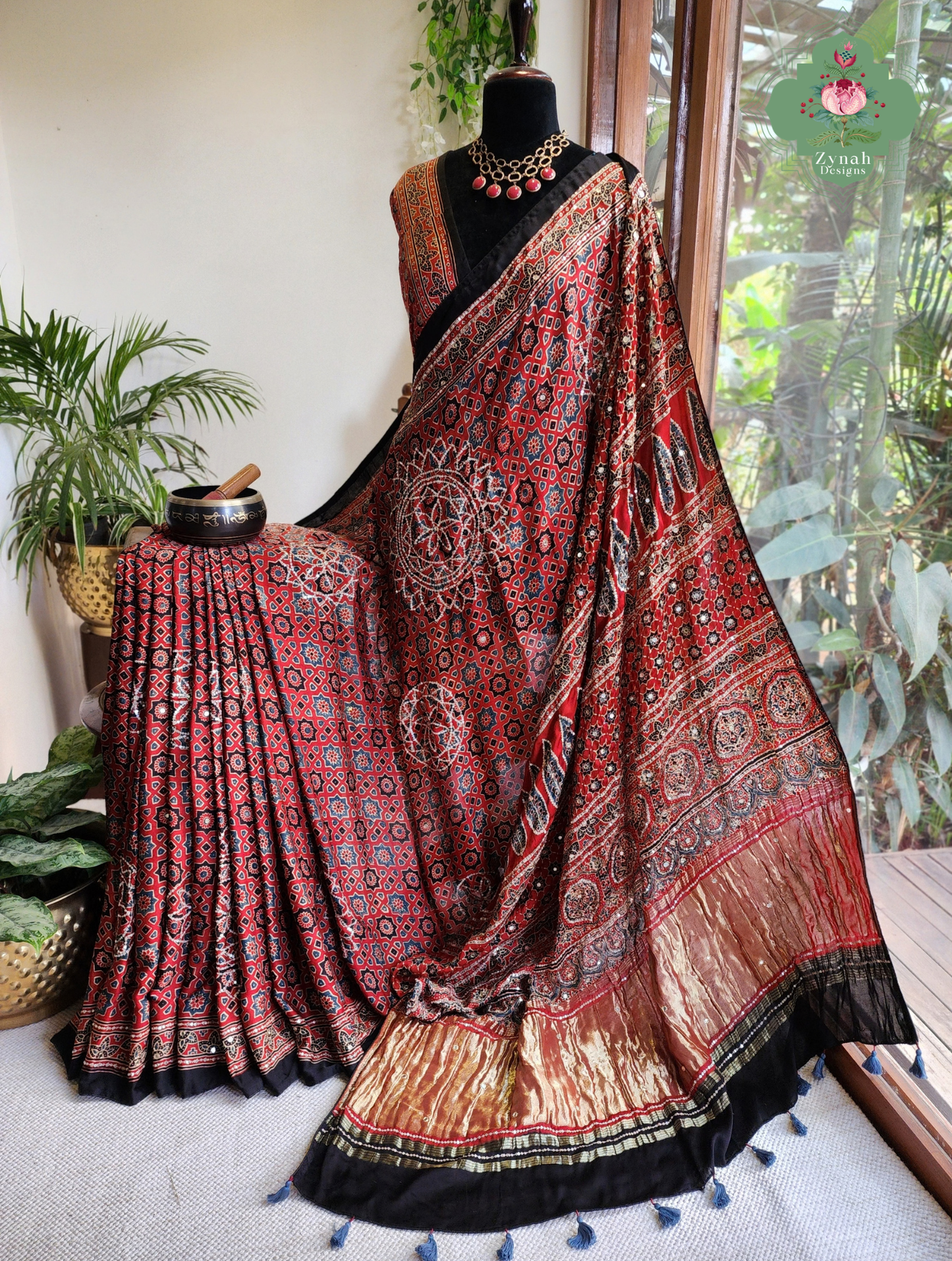 Zynah Kirmizi – Madder Red Pure Modal Silk Ajrakh Saree with Ajrakh Hand Block Printing & Artisan Adornments