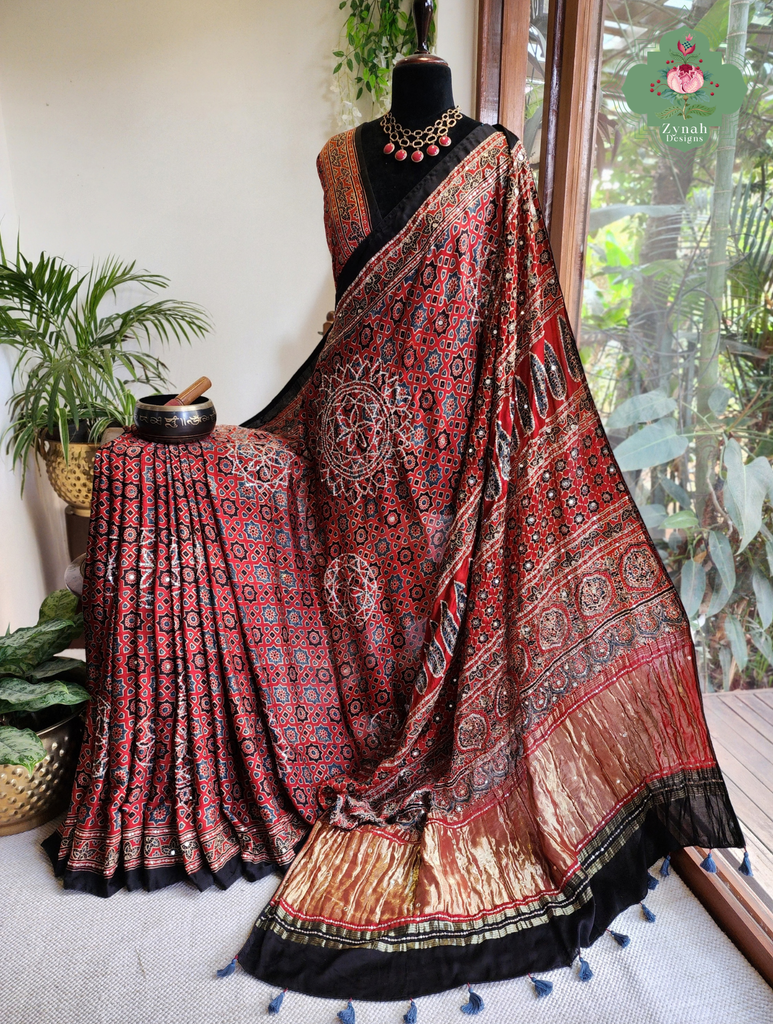 Zynah Made To Order Madder Red Ajrakh Modal Silk Saree With Lagdi Patta Pallu & Hand Embellishments; Custom Stitched/Ready-made Blouse, Fall, Petticoat; SKU:1103202603