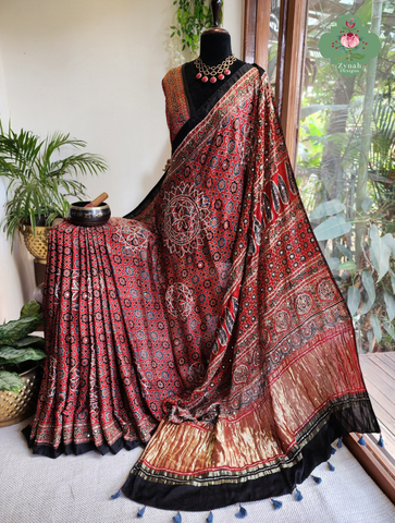 Zynah Made To Order Madder Red Ajrakh Modal Silk Saree With Lagdi Patta Pallu & Hand Embellishments; Custom Stitched/Ready-made Blouse, Fall, Petticoat; SKU:1103202603