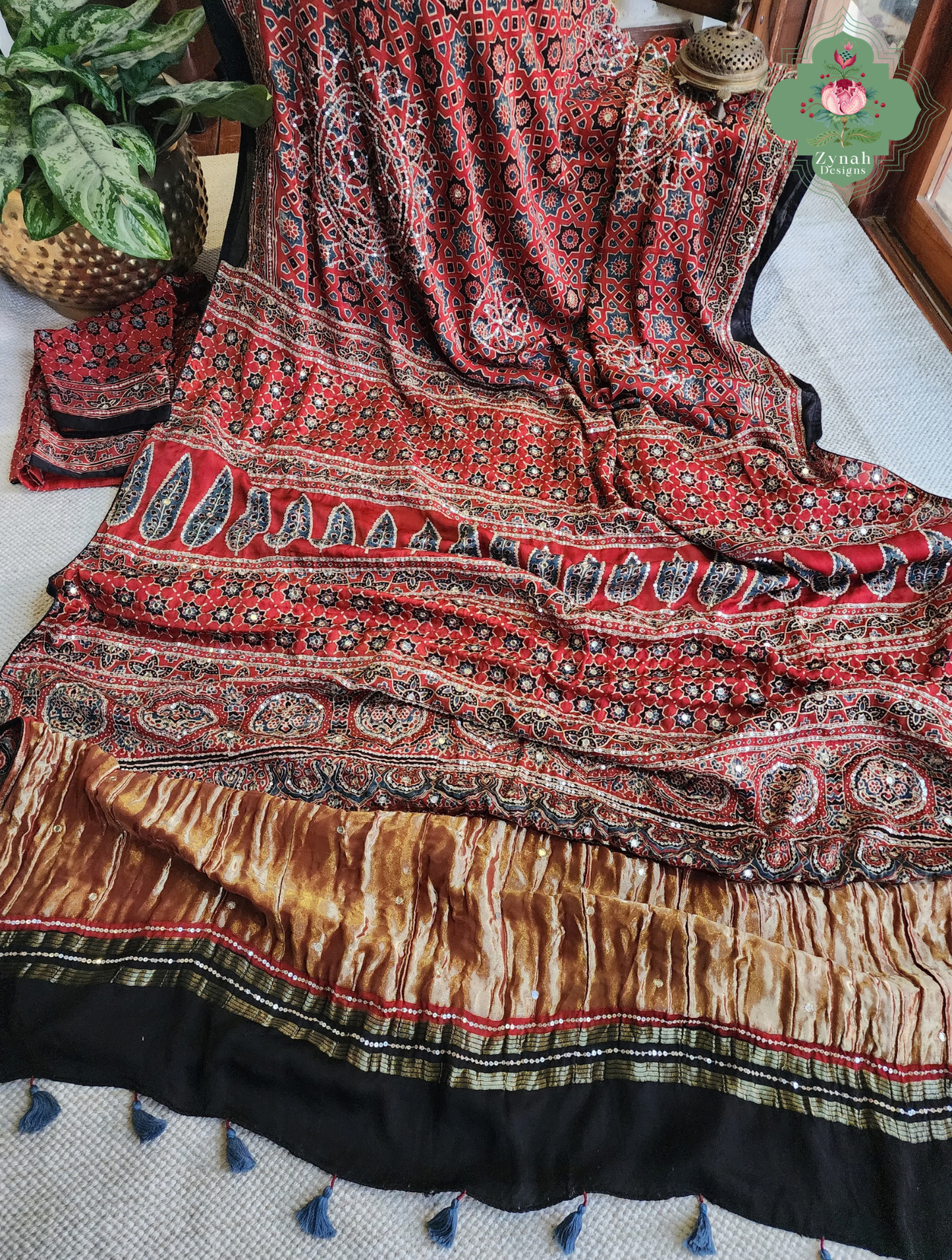 Zynah Kirmizi – Madder Red Pure Modal Silk Ajrakh Saree with Ajrakh Hand Block Printing & Artisan Adornments