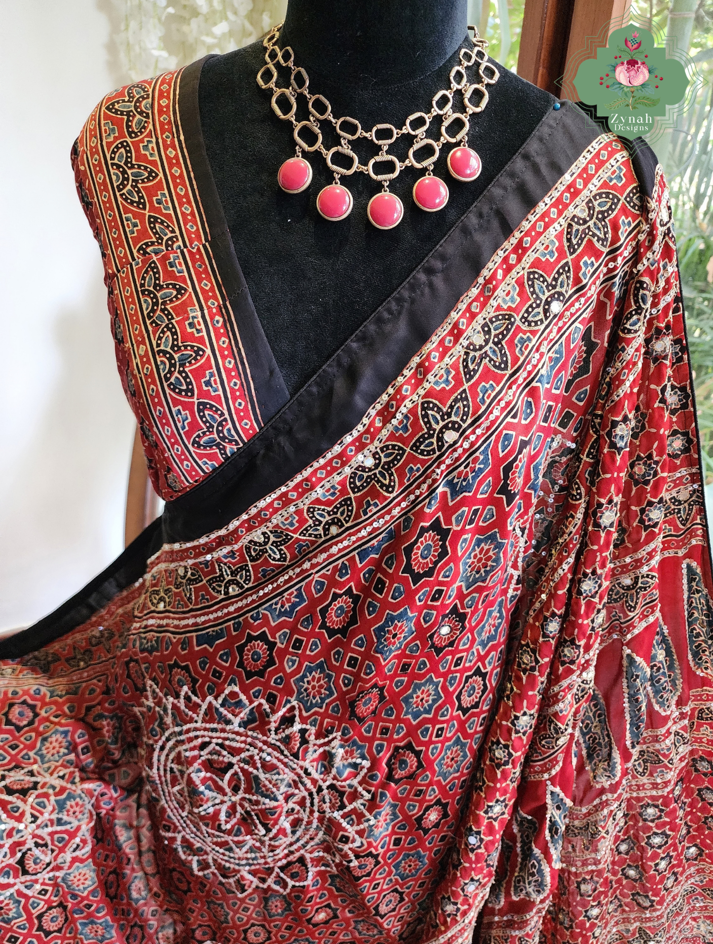 Zynah Kirmizi – Madder Red Pure Modal Silk Ajrakh Saree with Ajrakh Hand Block Printing & Artisan Adornments