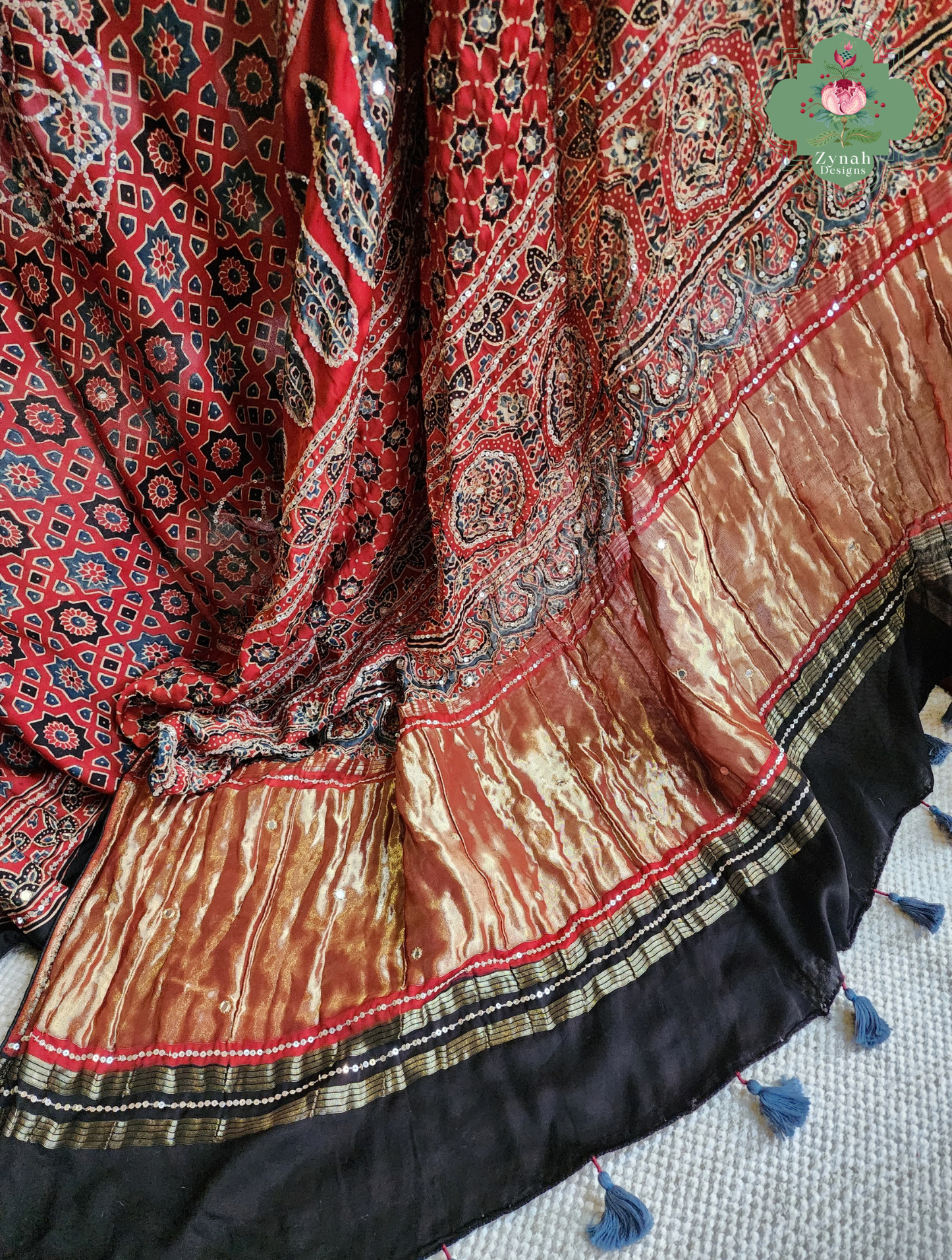 Zynah Kirmizi – Madder Red Pure Modal Silk Ajrakh Saree with Ajrakh Hand Block Printing & Artisan Adornments