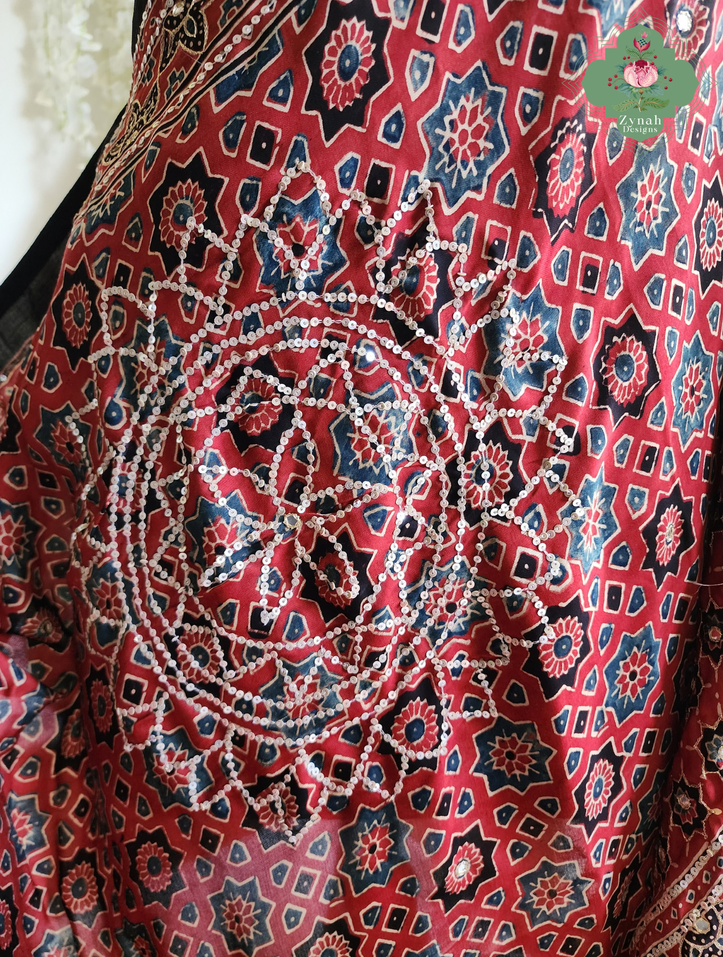Zynah Kirmizi – Madder Red Pure Modal Silk Ajrakh Saree with Ajrakh Hand Block Printing & Artisan Adornments