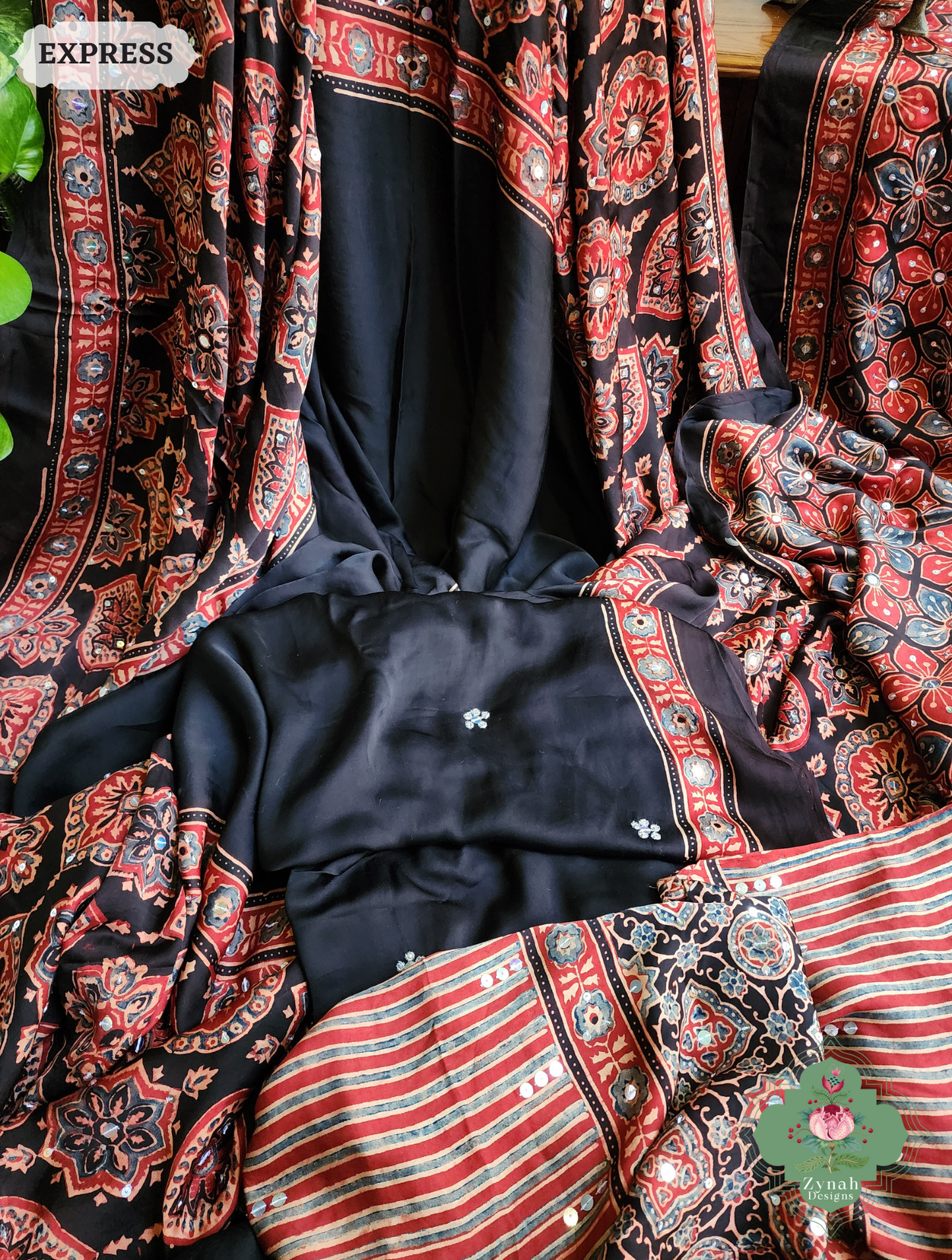 Zynah Madder Red & Black Ajrakh Modal Silk Saree With Sequins Highlight Crafted Using The Traditional Method Of Hand Block Printing Using 100% Natural Dyes; Custom Stitched/Ready-made Blouse, Fall, Petticoat; SKU: 1402202506