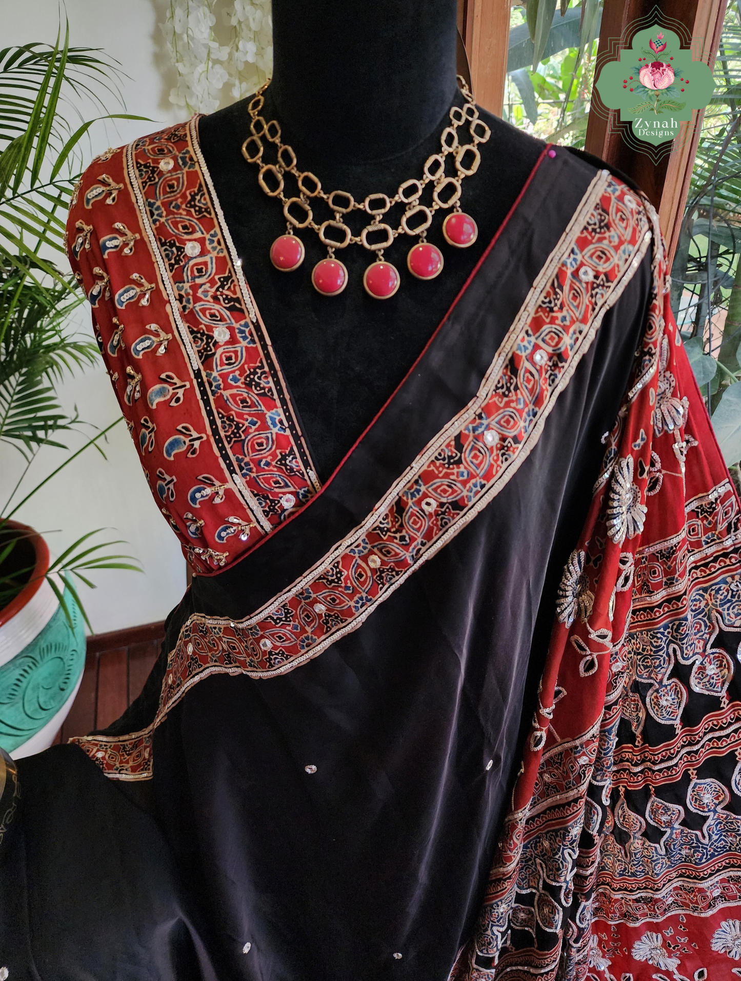 Zynah Siahra – Madder Red & Black Pure Modal Silk Ajrakh Saree with Ajrakh Hand Block Printing & Artisan Embellishments