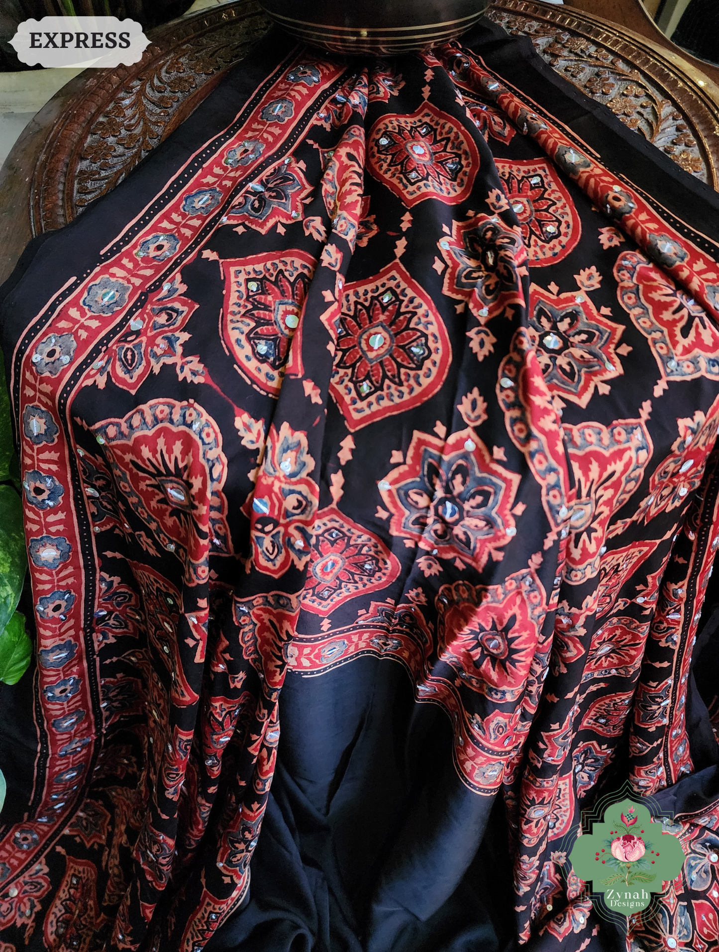 Zynah Madder Red & Black Ajrakh Modal Silk Saree With Sequins Highlight Crafted Using The Traditional Method Of Hand Block Printing Using 100% Natural Dyes; Custom Stitched/Ready-made Blouse, Fall, Petticoat; SKU: 1402202506