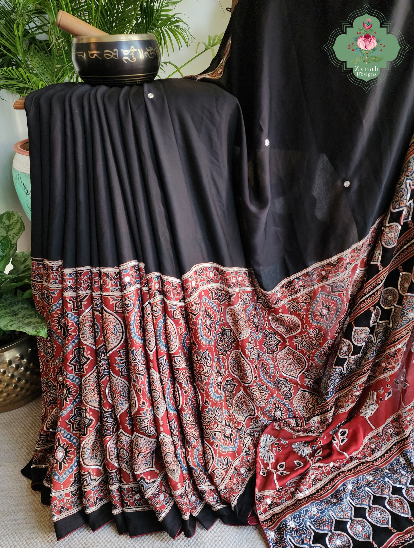 Zynah Siahra – Madder Red & Black Pure Modal Silk Ajrakh Saree with Ajrakh Hand Block Printing & Artisan Embellishments