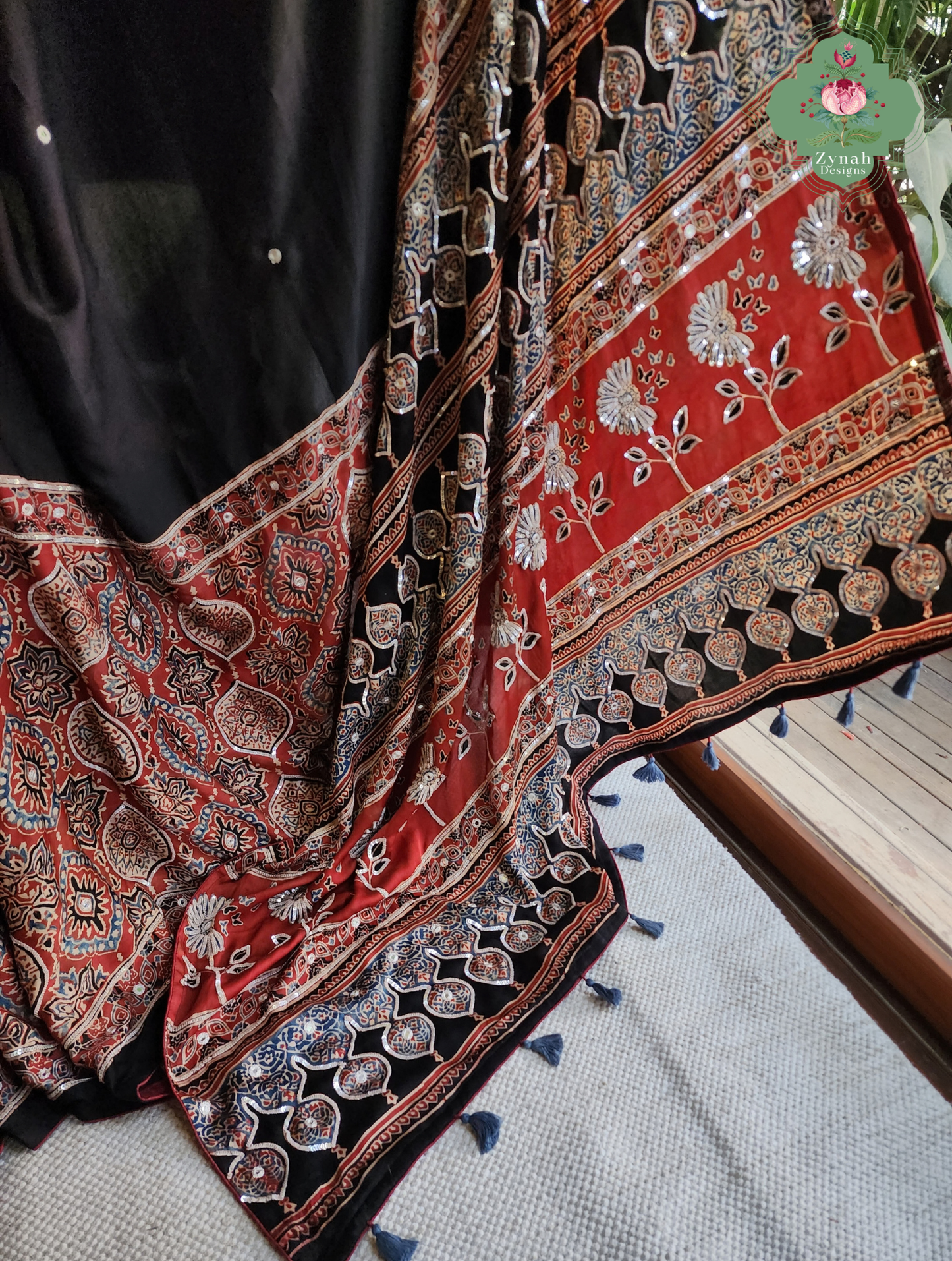 Zynah Siahra – Madder Red & Black Pure Modal Silk Ajrakh Saree with Ajrakh Hand Block Printing & Artisan Embellishments