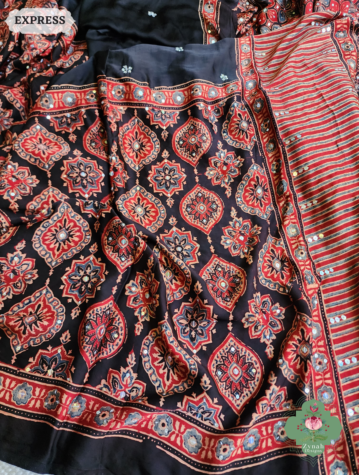 Zynah Madder Red & Black Ajrakh Modal Silk Saree With Sequins Highlight Crafted Using The Traditional Method Of Hand Block Printing Using 100% Natural Dyes; Custom Stitched/Ready-made Blouse, Fall, Petticoat; SKU: 1402202506