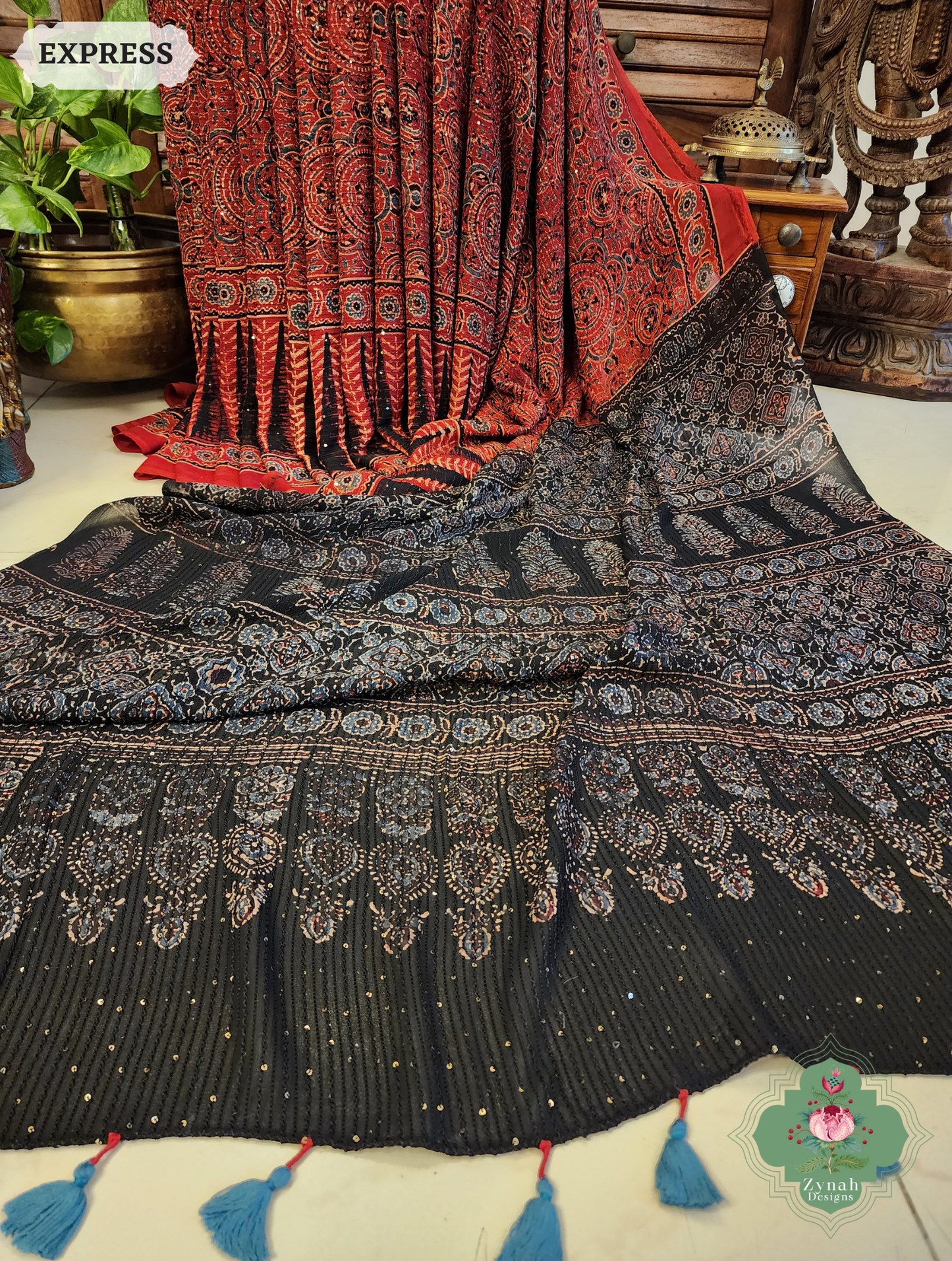 Zynah Madder Red & Black Hand-Block Printed Georgette Silk Ajrakh Saree with Sequins Highlight; Custom Stitched/Ready-made Blouse, Fall, Petticoat; SKU: 1004202503