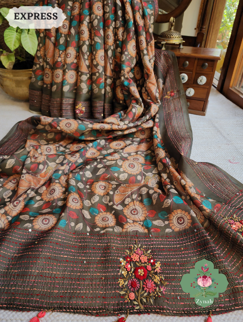 Dark Moss Green Jute Tussar Saree with Kalamkari, Frenchknot & Kantha embroidery, sequins.