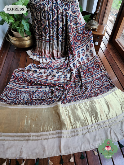 Off White Ajrakh Modal Silk Saree With Lagdi Patta On Pallu, Crafted Using The Traditional Method Of Hand Block Printing Using 100% Natural Dyes