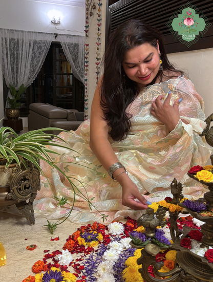 Malarika Off White Organza Silk Saree With Pastel Floral Embroidery & Patchwork
