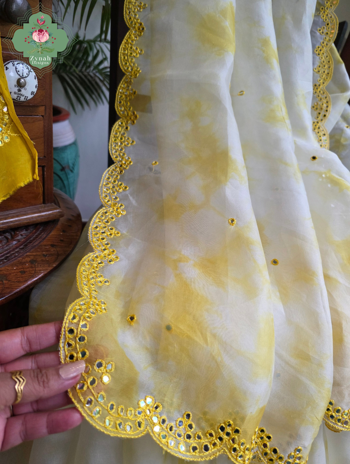 Manjari Off White / Yellow Organza Silk Saree With Hand Mirrorwork