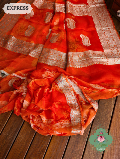 Zynah Orange Pure Khaddi Georgette Floral Banarasi Saree With Silver Zari; Custom Stitched/Ready-made Blouse, Fall, Petticoat; SKU: 2804202301