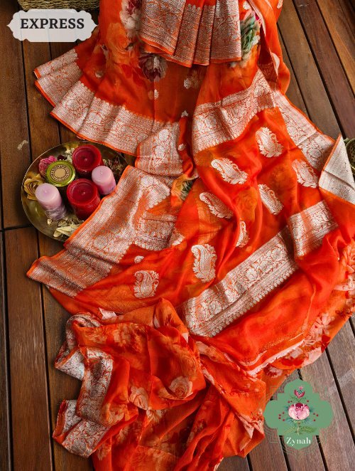 Zynah Orange Pure Khaddi Georgette Floral Banarasi Saree With Silver Zari; Custom Stitched/Ready-made Blouse, Fall, Petticoat; SKU: 2804202301