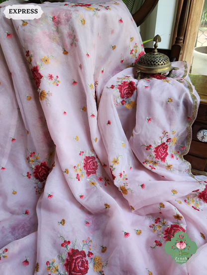 Zynah Pink Organza Silk Saree Featuring Cross-Stitch Embroidered Roses & Scalloped Border Hand Embellished With Cutdana; Custom Stitched/Ready-made Blouse, Fall, Petticoat; SKU: 1112202401