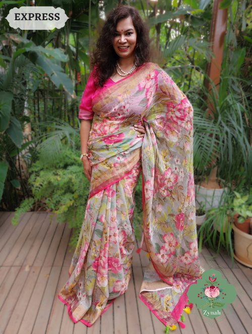 Powder Blue Bold Floral Linen Saree: premium linen fabric with a striking floral print in blue. 