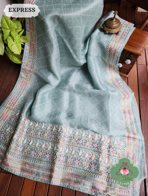 Zynah Powder Blue Organza Silk Saree With Bandhani Prints & Multi-coloured Embroidery On Pallu And Border; Custom Stitched/Ready-made Blouse, Fall, Petticoat; SKU: 1905202301