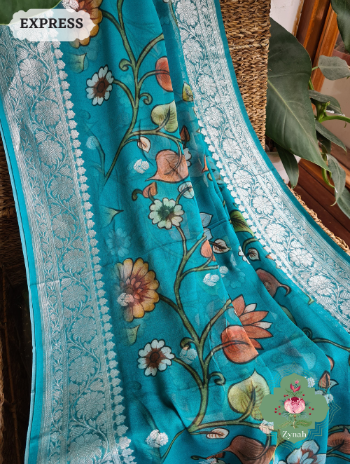 Zynah Turquoise Pure Khaddi Georgette Floral Banarasi Saree With Silver Zari; Custom Stitched/Ready-made Blouse, Fall, Petticoat; SKU: 2804202303