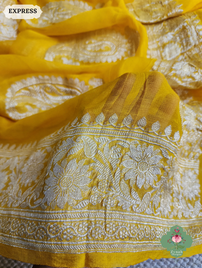 Zynah Yellow Handwoven Pure Khaddi Chiffon Banarasi Saree With Pure Silver Water Zari Woven Butas & Border; Custom Stitched/Ready-made Blouse, Fall, Petticoat; SKU: 2901202501